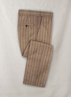 For a contemporary style with a twist, opt for our Italian Wool Cashmere Brown Stripe pants to make a statement; the wool pants are subtle yet stylish and give a flattering silhouette with a stripe pattern that is ideal for a traditional look. #studiosuits #mensclothingstyle #menswear #mensoutfits #mensattire #gentlemanstyle #classymen #elegantmen#bold#classic #mensstyle#mensfashion#new#chasmere brown #pants Men Pants Pattern, 1920s Mens Fashion, Red Tuxedo, Gentleman Lifestyle, Grey Wool Suit, Stripe Suit, Blue Linen Shirt, Brown Corduroy Jacket, Italian Suit