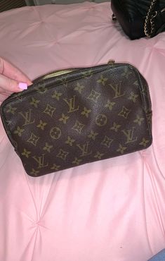 Authentic Louis Vuitton toilette 23 with brass hardware does have a few stains the zipper does not work properly and does not zip all the way around like it should but can be fixed does not come with dust bag or box can be used as a cosmetic travel bag date code is hard to read 833 please ask questions if you have any before purchasing price firm Travel Cosmetic Bags, Brass Hardware, Authentic Louis Vuitton, Travel Bag, To Read, The Way