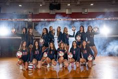 the volleyball team is posing for a photo