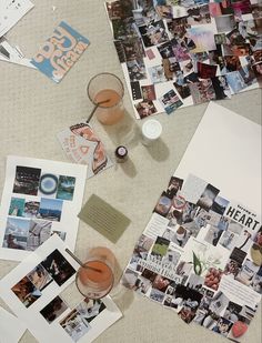 a table topped with pictures and drinks on top of a white floor covered in papers