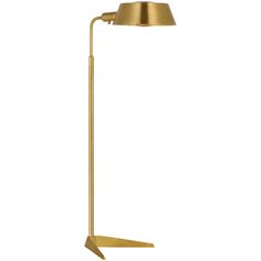 a gold floor lamp with an angled arm and a brass shade on the top, in front of a white background