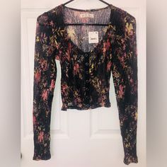 “Dark Combo” Colored Free People Long Sleeve Lace/Sheer Floral Shirt. Buttons Down The Center. Scoop Neck. It Is Completely Sheer (Not So See Through Since Darker Color Lace). New With Tags. Make Me An Offer! *Have Same Shirt In “Light Combo” Also In My Closet* Fitted Black Floral Print Tops, Floral Print Long Sleeve Top For Night Out, Long Sleeve Floral Print Tops For Night Out, Black Floral Print Tops For Fall, Casual Floral Print Blouse For Night Out, Stretch Floral Print Tops For Night Out, Lace Long Sleeve Shirt, Free People Long Sleeve, Lace Long Sleeve