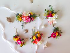 the flowers are arranged on top of each other in order to look like they were made out of seashells