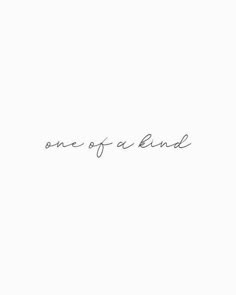 the word one of a kind written in cursive handwriting on a white background