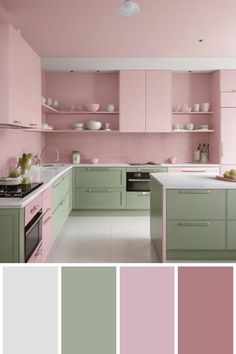 a pink and green kitchen with white counter tops