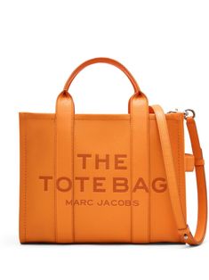 tangerine orange leather logo print to the front logo patch to the rear two rounded handles to the sides adjustable shoulder strap internal pocket internal logo plaque top zip fastening Marc Jacobs Tote, The Tote Bag, Orange Bag, Leather Cap, Medium Tote, Orange Leather