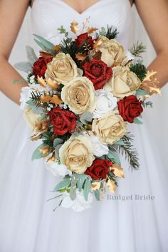 a bridal holding a bouquet of red and white flowers