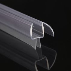 an image of clear plastic tube on black background