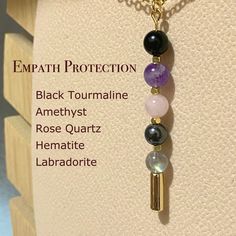 All Necklace are handmade and designed by us. In our store you will find high quality jewelry and in a reasonable price. -Benefits of Crystals- All crystal beads in our store are natural and in high grade Black Tourmaline: Appreciated for its grounding properties. Dream Amethyst: Symbolic of spiritual connection and inspiration. Rose Quartz: Represents love and emotional balance. Hematite: Known for its balancing and grounding qualities. Labradorite: Associated with intuition and personal growth Dream Amethyst, Raw Rose Quartz, Healing Crystal Jewelry, Crystal Necklaces, Protection Necklace