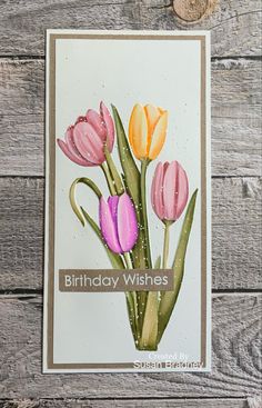 a birthday card with watercolor tulips and the words, happy birthday wishes