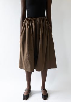 Tie Skirt in Chocolate from Brooke Callahan. Pull on cotton poplin skirt with fully adjustable tie waist. Creates gathering around the waist for full skirt shape, hits mid calf. Designed, cut and sewn in Echo Park, Los Angeles. Need a second opinion? If you have special requests or just need advice, please reach out to hello@shop-vestige.com. 100% Cotton. Made in Echo Park, Los Angeles Brooke Callahan, Echo Park Los Angeles, Poplin Skirt, Tie Skirt, Echo Park, Hair Designs, Summer Essentials, Full Skirt, Denim Top