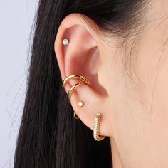 This stylish ear cuff is the perfect accessory for expressing your individual sense of style. Crafted from stainless steel, it features a unique double line design that adds a hint of personality to any outfit. Show off your unique style with this fashionable ear cuff! Detail： -Material: gold plated stainless steel or stainless steel -Tarnish proof and durable so you can wear it everyday without worry! Quantity & Measurement：-Internal diameter: 11.5mm-Include: single item *Get inspired: 365 days Basic Earrings, Flat Piercing, Ear Style, Daisy Studs, Gold Ear Cuff, Silver Ear Cuff, Conch Piercing, Opal Studs, Purple Sky