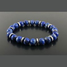 Genuine Natural Lapis Lazuli & Hematite Beaded Bracelet  This Beautiful Lapis Lazuli Healing Crystal Bracelet makes a wonderful Gift for Men or Women.  ❤️ All Bracelets are Crafted from High Quality GENUINE Gemstone Beads sourced from Reputable Healing Crystal Suppliers. You are buying a Handmade High Quality Gemstone Stretch Bracelet  Handmade with Lots of Love & Positive Energy Includes:  Strong Durable Stretch Cord White Organza gift bag Detailed Crystal Information  Crystal Gemstone Care Inf Adjustable Lapis Lazuli Bracelet With Round Beads, Polished Beads Lapis Lazuli Round Bracelets, Round Lapis Lazuli Bracelets With Polished Beads, Polished Beads Lapis Lazuli Bracelets, Adjustable Lapis Lazuli Bracelet With 8mm Beads, Adjustable Lapis Lazuli Stretch Bracelet With Round Beads, Lapis Lazuli Beaded Bracelets With Polished Round Beads, Silver Lapis Lazuli Bracelet, Hand-strung, Silver Lapis Lazuli Hand-strung Bracelets