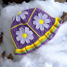 Would you like to spread positive energy around you with colorful floral motifs?  This knitted crochet daisy motif bucket hat is for you. In festivals, concerts, on the streets, in short, wherever there is life, all people will watch you. Cotton knitted hats  combined with these vibrant colors are waiting for their owners. Avaliable in any size of colour, custom orders always welcome Message for any enquires Visit our shop for more crochet hat items. Embrace the charm of nature with our lovely Knitted Daisy Bucket Hat. Handcrafted with care and adorned with adorable daisy motifs, this hat is the perfect blend of style and comfort. Designed to keep you stylishly shaded on sunny days, this bucket hat adds a touch of whimsy to any outfit. The soft, cozy, and breathable knit ensures a comforta Cute Multicolor Brimmed Bucket Hat, Summer Crochet Purple Hats, Handmade Whimsical Crochet Hat For Summer, Hand Knitted Multicolor Crochet Hat For Spring, Spring Crochet Yarn Bucket Hat, Yellow Knitted Crochet Hat For Spring, Summer Purple Crochet Hats, Multicolor Hand-knitted Crochet Hat For Spring, Spring Multicolor Hand-knitted Crochet Hat