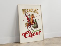 a christmas poster is hanging on the wall next to a wooden floor with a santa clause riding a horse