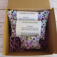 Relax with this Lavender Dream Box. Inside the box is one Lavender Eye Pillow filled with Grosso lavender buds and organic flax seeds, an Herbal Dream Pillow and one Lavender Sachet. This is a gift that is long lasting and Eco-Friendly. All of these pillows should last over a year and probably much longer. The eye pillow can be microwaved. Instructions will be added to the box for each pillow contained within. Pillows come in a brown Kraft box with purple shredding and a lavender bow. Grosso Lavender, Lavender Eye Pillow, Lavender Eye, Lavender Eye Pillows, Dream Pillow, Eye Pillow, Flax Seeds, Relaxation Gifts, Lavender Buds