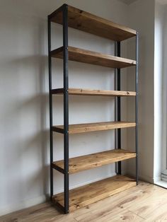 an empty room with some shelves in it