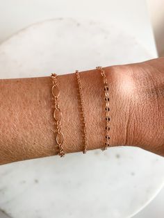 Now offering Permanent Jewelry at our shop, Catalyst Mercantile located at 117 N Main St, Mount Holly 28120! Treat yourself to dainty, high quality jewelry you never have to take off. Choose between 14k Gold Fill, 14k Rose Gold Fill, or Sterling Silver and have a bracelet, anklet or even a necklace made custom for you! What is Permanent Jewelry? It is a dainty everyday custom bracelet or anklet that is micro welded to your wrist to give you a totally seamless bracelet. It is a quick, fun, and to Permanent Jewelry, Rose Gold Charms, Custom Bracelet, Custom Bracelets, Jewelry Business, Gold Charm, High Quality Jewelry, Bracelet Designs, Quality Jewelry