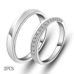 two white gold wedding rings with diamonds