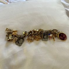 Vintage Monet 6” Charm Bracelet Loaded With Charms Maximalist Bracelet Stack, Collectible Yellow Gold Bracelets, Collectible Vintage Charm Costume Bracelets, Personalized Vintage Bracelet Jewelry, Antique Charm Bracelet, Vintage Trinkets, Monet Jewelry, Vintage Monet, Funky Jewelry