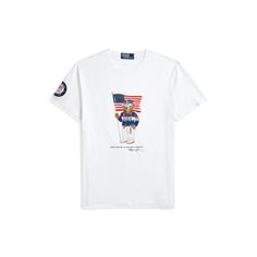 Part of the Polo Ralph Lauren Team USA Collection this Custom Slim Fit T-shirt features our iconic Polo Bear sporting the uniform Ralph Lauren designed for Team USA's flagbearer to wear during the Closing Ceremony of the Olympic and Paralympic Games Paris 2024. Ralph Lauren Sporty Graphic Print T-shirt, Flag Print Crew Neck Tops For Sports Events, Cotton Sports T-shirt With Flag Print, Ralph Lauren Short Sleeve Logo T-shirt, Graphic Tee With Flag Print And Crew Neck, Flag Print Graphic Tee With Crew Neck, Graphic Tee T-shirt With Flag Print And Crew Neck, Ralph Lauren Crew Neck Tops With Letter Print, Graphic Tee With Flag Print Crew Neck