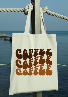 Our Coffee Tote bags, make the perfect gift for coffee lover. We all know a coffee addict who would love this tote. Not only are they stylish they are also extremely practical for daily use. - Long Handles - Strong and Durable Material - Eco Friendly - Stylish and Practical - Large Tote bag Esty Shop.com, Happy Chef, Coffee Tote Bag, Tote Bags For College, Personalized Shopping Bags, Library Tote Bag, Chef Ideas, Uni Bag, Gift For Coffee Lover