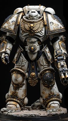 a white and gold painted warhammer is shown