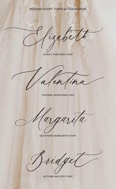 the wedding dress is hanging up with writing on it