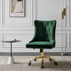 a green office chair sitting on top of a white rug in front of a wall