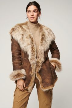 Natasha Hooded Toscana Sheepskin Coat | Overland Hooded Sheepskin Fur Coat With Faux Fur Trim, Luxury Fur Coat For Cold Weather, Luxury Hooded Fur Coat For Cold Weather, Luxury Hooded Faux Fur Outerwear, Luxury Shearling Fur Coat For Cold Weather, Hooded Sheepskin Outerwear With Faux Fur Trim, Sheepskin Hooded Outerwear With Faux Fur Trim, Hooded Outerwear With Faux Fur Trim And Sheepskin, Hooded Outerwear With Faux Fur Trim In Sheepskin