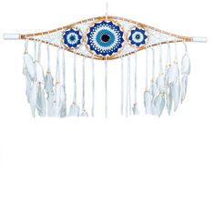 a blue and white wall hanging with feathers