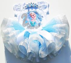 I offer you a beautiful outfit in the style of Elsa. The outfit is made of quality materials so as not to damage the baby's skin. NOTES FOR THE SELLER -Number for personalizing the top. -Name to personalize the vertex. -Need by date. Sleeve for the top - short, long. TOP. The top of it is 100% cotton. Size 3-24 months it is a bodysuit, 2T-10T it is a shirt. (Since it is more handmade always remember the shirt needs to be washed inside out, hand washed and air dried). SKIRT - made of soft tulle, Halloween Costume Unicorn, Frozen First Birthday, Peppa Pig Birthday Outfit, Frozen Tutu Dress, Frozen Birthday Outfit, Anna Birthday Party, Elsa Tutu, Frozen Tutu, Birthday Tutu Dress