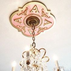 a pink chandelier hanging from the ceiling