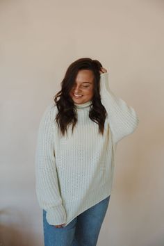 front view of model wearing the patiently waiting sweater in the color ivory. model has the sweater paired with the aurora denim. Mini Outfit, Patiently Waiting, Fitted Turtleneck, Early Fall Outfit, Open Knit Sweater, Classic Elegant, Oversized Silhouette, Open Knit, Winter Outfits Women