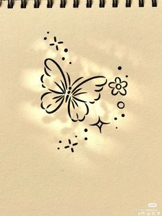 a drawing of a butterfly with flowers on it