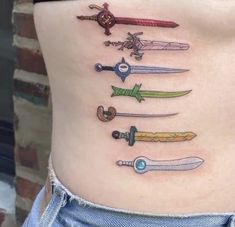 a woman's stomach with different types of swords on it