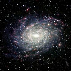 an image of a spiral galaxy in the sky