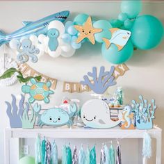 an under the sea birthday party with balloons and decorations