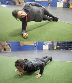 a woman is doing push ups on the ground in an indoor gym area with grass