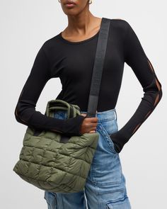 VeeCollective "Porter" tote bag in quilted waterresistant nylon and faux leather (polyurethane)    Flat top handles     Detachable, adjustable shoulder strap, 14" drop/ 32"56"L    Zip top closure     Exterior, two zip pockets     Interior, zip pocket     Approx. 10"H x 16"W x 7.5"D    Hand wash    Imported Flats Top, Zip Top, Top Designers, Neiman Marcus, Zip Pockets, Wallets, Porter, Tops Designs, Shoulder Strap