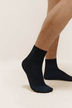 Everyday low-profile minimalist socks with one purpose: keeping your feet warm & cozy. Our Men’s Mid-Calf Socks come in a convenient value pack (perfect for stocking your own sock drawer or as a practical gift for loved ones). Details Materials & Care Shipping & Returns • Mid-calf socks in easy-to-match colors. Each pack includes three pairs of socks.• Made from a comfortable, antibacterial blend of cotton & Spandex that keeps skin clean, dry, and healthy.• Easy care: durable & machine washable. Match Colors, Sock Drawer, Healthy Easy, Calf Socks, Cotton Socks, Clean Skin, Grey Cotton, Crew Socks, Mid Calf