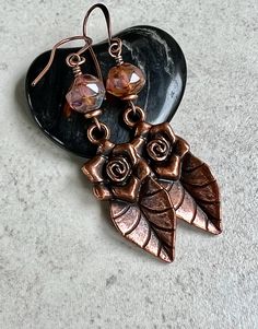 "copper pink earrings   flower leaf earrings   pink czech glass boho dangle earrings * Czech glass soft faceted beads - 7x9mm * milky light pink color with light brown Picasso coating * large antiqued copper plated flower and leaf pendant - 12x33mm * antiqued copper plated hook ear wires * total length - 2 1/2\" * you can enter my shop here:    gypsydangles.etsy.com"