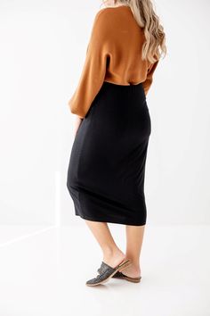 Effortless and elegant, the 'Sasha' is what skirt dreams are made of! Tailored in a modern midi length, this soft knit pull-on skirt is fitted with a hidden elastic waistband for a secure fit. From everyday wear to business casual to Sunday morning - this basic skirt is a must have for every modest wardrobe! Exclusively designed with you in mind. 95% Rayon 5% Spandex Hand Wash Cold Do Not Bleach Lay Flat or Hang to Dry Low Iron if Needed Partially Lined Model Height 5'6" | Wearing Size Medium Pl Modest Stretch Skirt With Elastic Waistband, Stretch Midi Pencil Skirt In Solid Color, Solid Stretch Skirt For Daywear, Versatile Midi Length Relaxed Skirt, Comfortable Versatile Midi Skirt, Versatile Midi Length Skirt For Day Out, Stretch Midi-length Pencil Skirt For Day Out, Stretch Midi Length Pencil Skirt For Day Out, Spring Stretch Midi Length Pencil Skirt