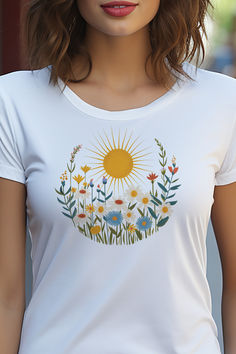 Get ready to blossom with this Sun and Wild Flowers Folk Art Design Unisex Jersey Short Sleeve Tee! Perfect for those who don't take themselves too seriously, this unique tee features a playful mix of color and pattern. Don't miss out on this quirky and fun piece Unique Shirt Design Ideas, Artsy Printed T-shirt For Spring, Summer Folk Style Embroidered Shirt, Spring Folk Style Embroidered Shirt, Bohemian T-shirt With Floral Embroidery And Short Sleeves, Bohemian T-shirt With Floral Embroidery, Unique Shirts Design, Tshirt Painting