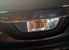 the license plate on this car is clearly visible for us to see, it's in debt