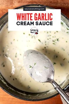 white garlic cream sauce in a pot with a ladle on the side and a sign that reads, white garlic cream sauce