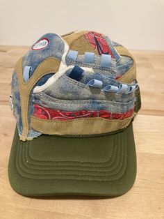 Handcrafted with 50% recycled material. One size fits all. Spring Outdoor Denim Hat, Denim Baseball Cap For Streetwear, Denim Cap For Streetwear, Denim Cap For Outdoor Use, Denim Cap For Outdoor, Urban Hat With Short Brim, One Size Fits Most, Urban Short Brim Hat, One Size Fits Most, Urban Short Brim Hat One Size, Denim Streetwear Cap