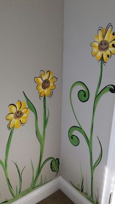 a painted wall with flowers on it