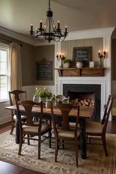 a dining room table and chairs with a fireplace in the background