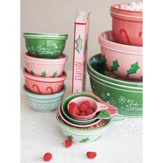 a stack of bowls with raspberries in them next to a tube of toothpaste